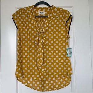 New with tags yellow polka dot shirt.
